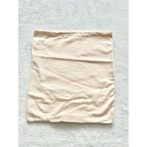 BADGLEY MISCHKA cream colored dust bag